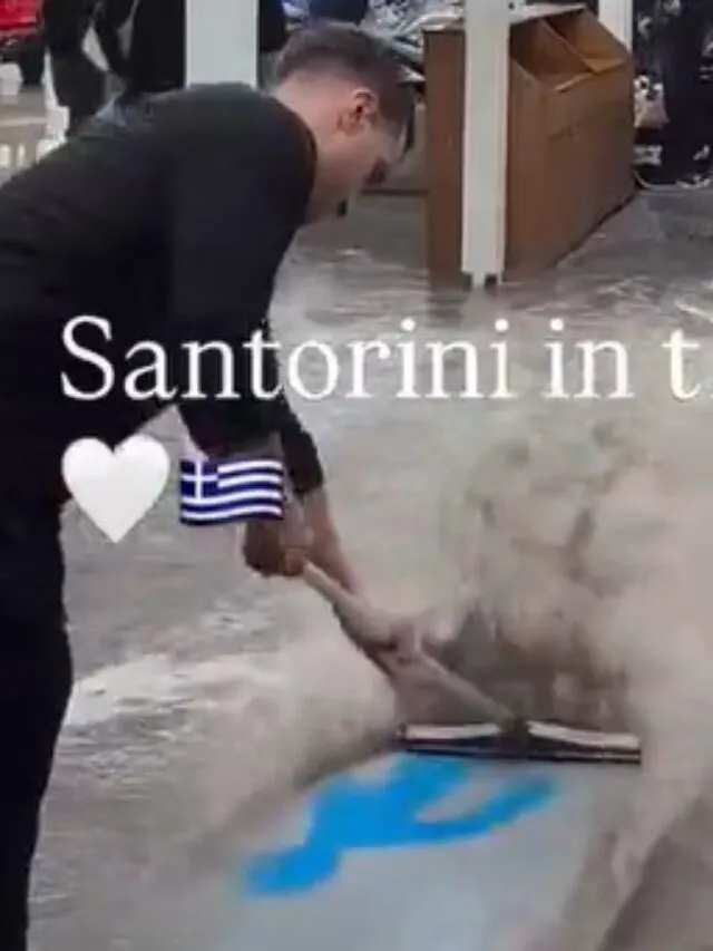 Επιχείρηση στη Σαντορίνη έβαλε δύο εργαζόμενους να σφουγγαρίσουν την πλημμύρα